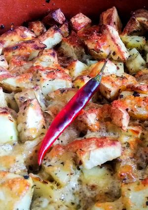 A picture of Fragrant Roasted Potatoes with Melted Cheddar Cheese (Vegetarian).