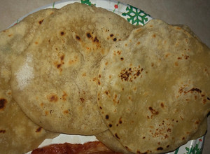A picture of Roti bread (Buttery Indian flat bread).