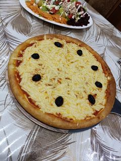 صورة لوصفة بيتزا 🍕🍅🧀