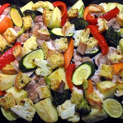 Chicken & Vegetables Tray Bake With Garlic Bread A picture of Chicken & Vegetables Tray Bake With Garlic Bread.