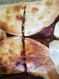 Una foto de Pastel estilo crunchy wrap (tco bell)