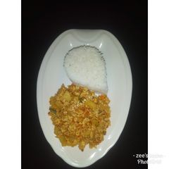 A picture of White rice with egg and awara (tofu)sauce.