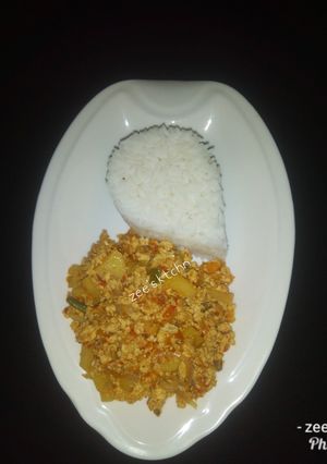 A picture of White rice with egg and awara (tofu)sauce.