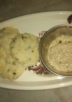 A picture of Vegetable idli with peanut coconut chutney.