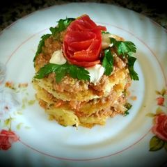 Sandwich with grated potato and chopped meat,cheese,tomato A picture of Sandwich with grated potato and chopped meat,cheese,tomato.