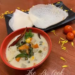 A picture of Appam and stew.