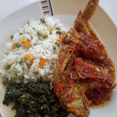 A picture of Vegetable rice,chicken,managu #maindish#teamalpha#luhyalocaldish.