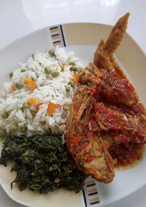 A picture of Vegetable rice,chicken,managu #maindish#teamalpha#luhyalocaldish.