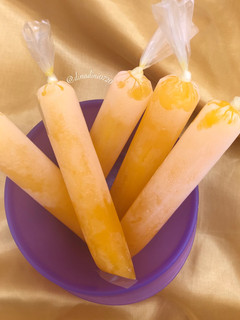 Foto resep Es Lilin Nutrisari Mangga