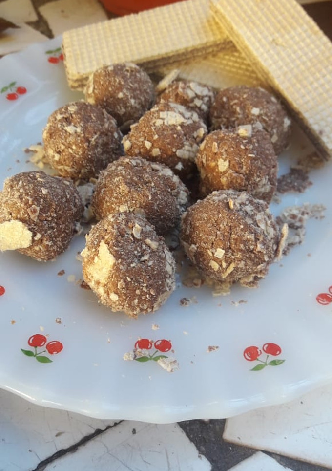 Una foto de Trufas de galletitas y dulce de leche