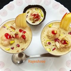 A picture of Fruits Balls In Coco Custard.