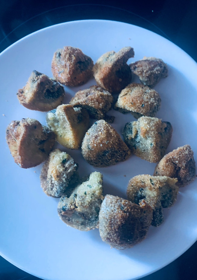Una foto de Champiñones fritos
