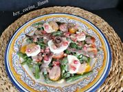 Una foto de ensalada anchoas