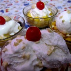 A picture of Fruit Salad with Ice cream.