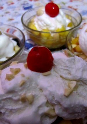 A picture of Fruit Salad with Ice cream.