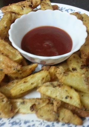 A picture of Masala Potato Wedges.