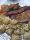 Vacío al horno con verduras y papas