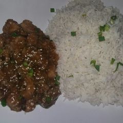A picture of Crispy sesame Pork Sauce with Basmati Rice.