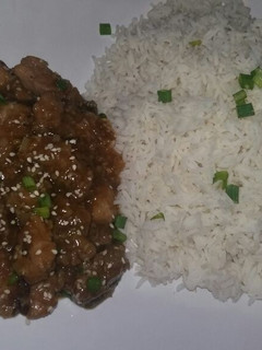A picture of Crispy sesame Pork Sauce with Basmati Rice.