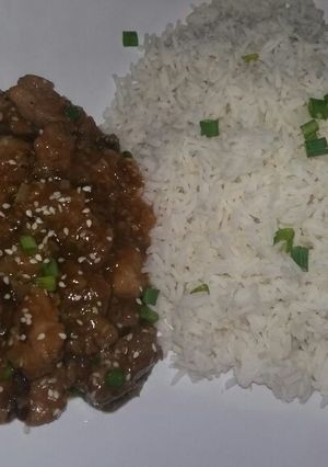 A picture of Crispy sesame Pork Sauce with Basmati Rice.