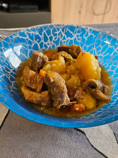 Una foto de Cerdo con champiñones