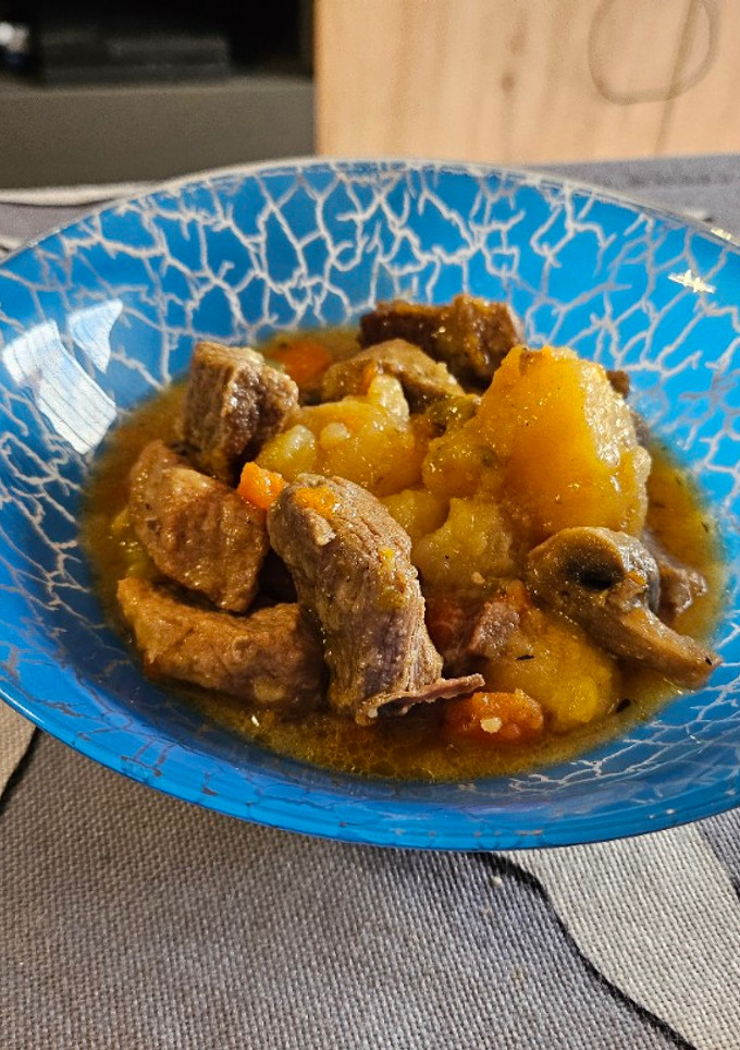 Una foto de Cerdo con champiñones