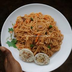 A picture of Jollof Spaghetti (Pasta in Tomato Sauce).
