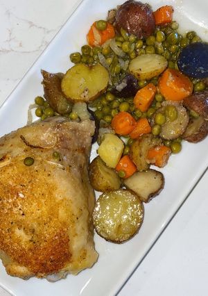 A picture of Mare’s Chicken with Potatoes and Peas.