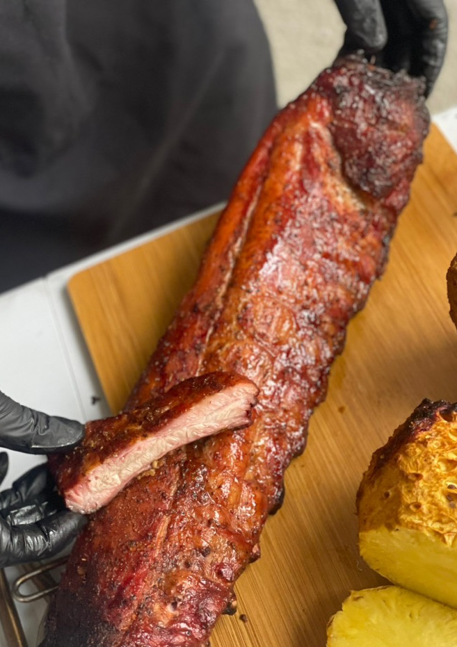 Una foto de Baby back ribs ahumada