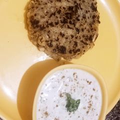 A picture of Sabudana Thalipeeth with koshimbir (maharastrain style).
