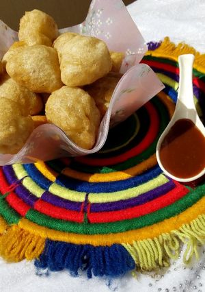 A picture of Puffpuff and caramel sauce.
