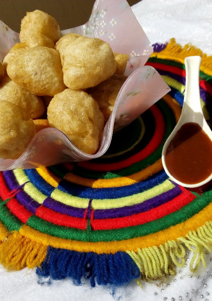 A picture of Puffpuff and caramel sauce.
