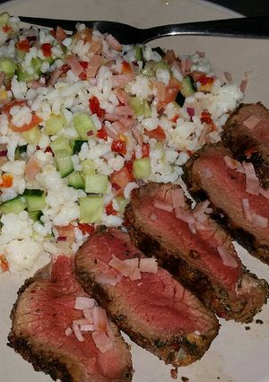 A picture of Grilled greek beef w' cold rice salad & bacon crumble.