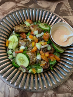 A picture of Grilled chicken and paste.