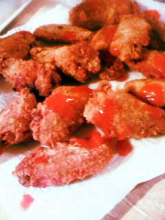 A picture of Juicey j's fried hot wings.