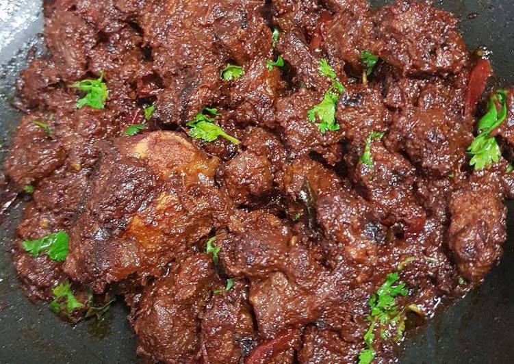 Spicy lamb ghee varuval