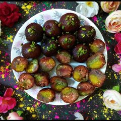 A picture of Rainbow gulab jamun.