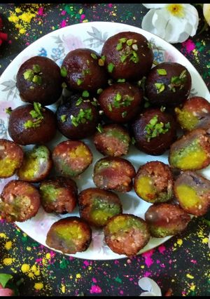 A picture of Rainbow gulab jamun.