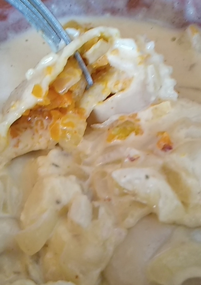 Una foto de Ravioles caseros de verdura con salsa roquefort