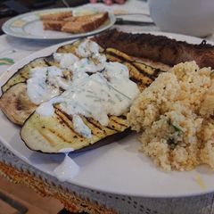 A picture of Grilled Aubergine with Yogurt Sauce.