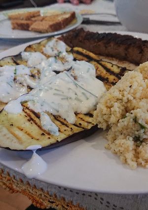 A picture of Grilled Aubergine with Yogurt Sauce.