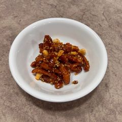 A picture of Honey glazed baby corn.
