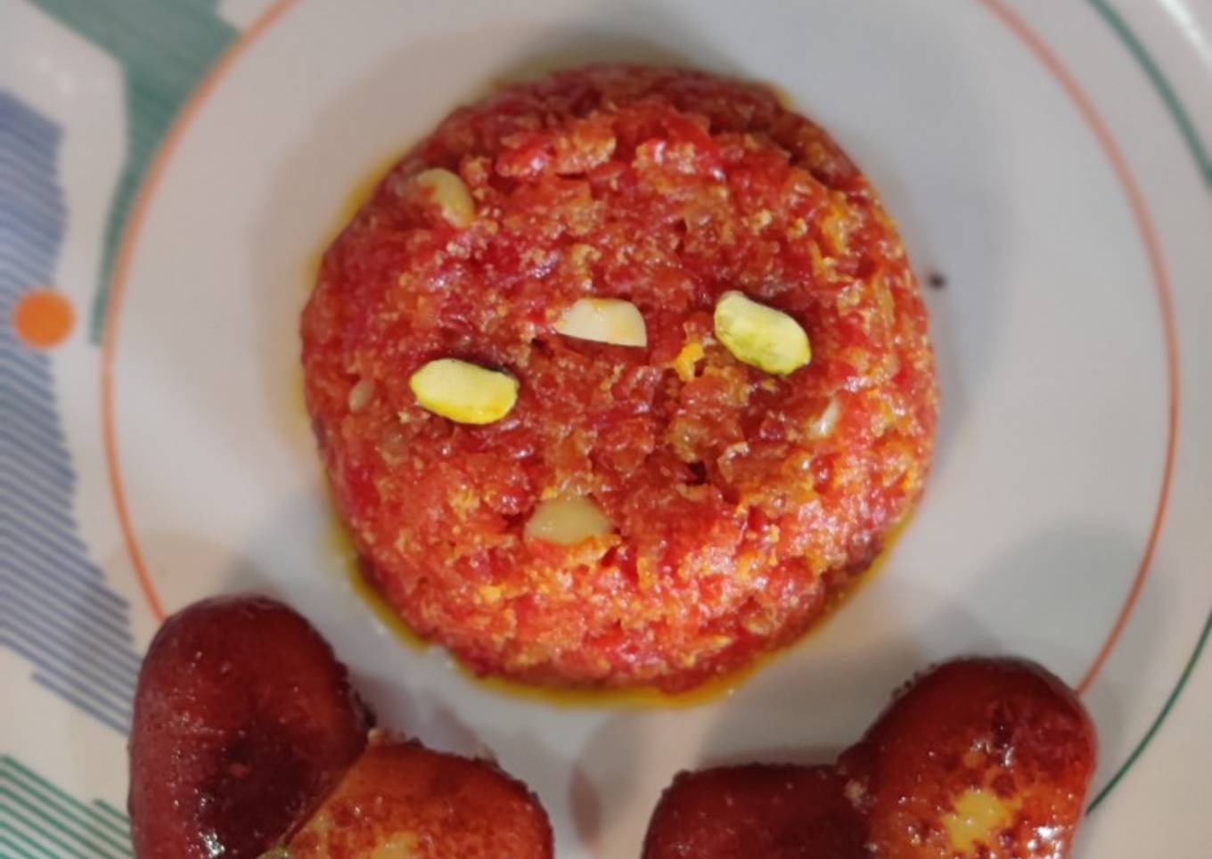 Kalojam with gajar halwa