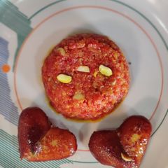 A picture of Kalojam with gajar halwa.
