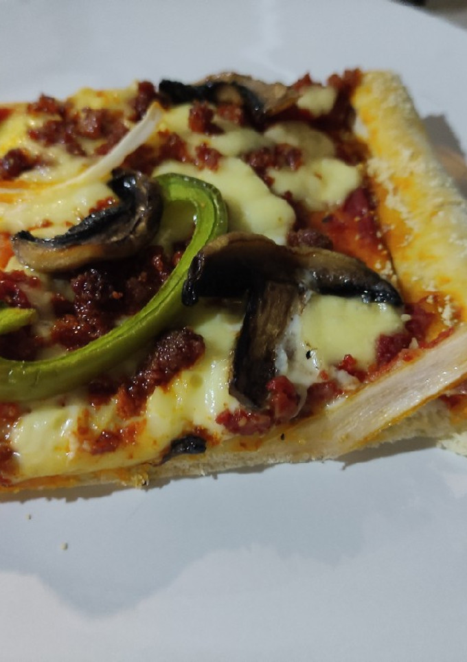 Una foto de Pizza