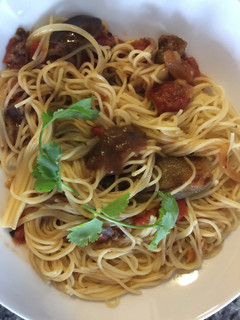 A picture of Angel Hair Pasta Garlic, Tomatos and Achar Masala.