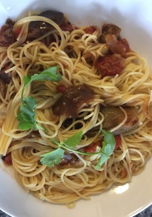 A picture of Angel Hair Pasta Garlic, Tomatos and Achar Masala.