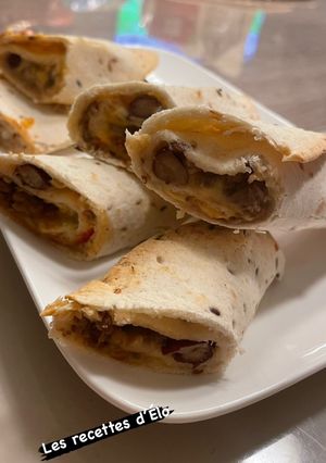 Une photo de Burritos bœuf et cheddar