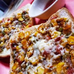 A picture of Corn cheese open sandwich.