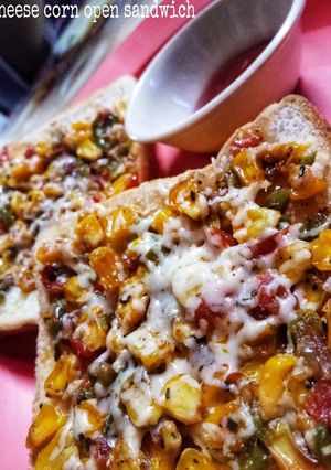 A picture of Corn cheese open sandwich.